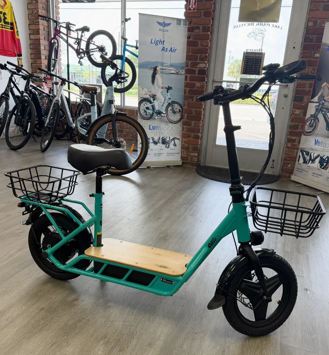 Seated electric scooter